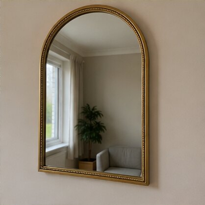 Brass-framed wall mirror